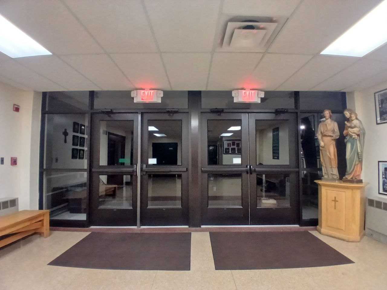Entrance doors, mats, and hard flooring in an education facility